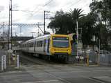 135357: Westgarth Street Level Crossing Down Suburban 6-car X'Trapolis 948 M leading