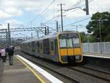 137318: Clyde Down Suburban 8-car Tangara D 6115 leading