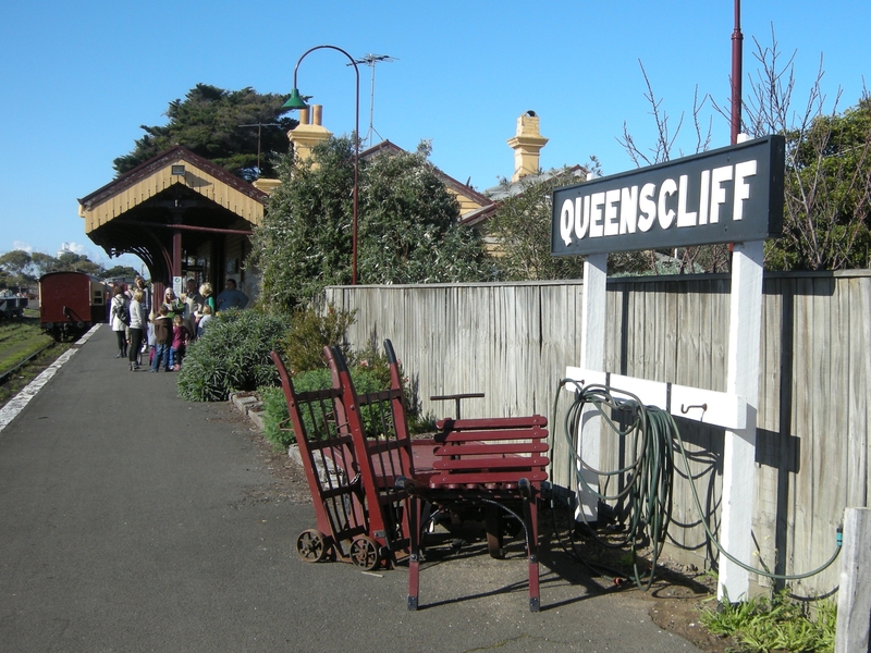 137687: Queenscliff looking along platform towards EOT Platform barrow trolleys and luggage trolley