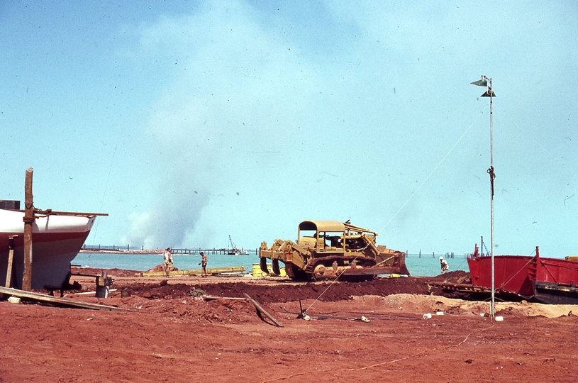 400106: Groote Eylandt NT BHP site Milner Bay unloading D9 from Barge 'Hawk'