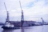 400527: Melbourne Victoria A J Wagglen floating dry dock being returned to its original site after dredging