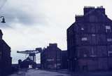 401417: Glasgow Scotland Govan Street scene Cupola over entrance to Clyde Pedestrian Tunnel at end of street